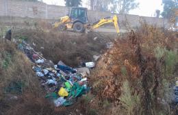 Limpieza de desagüe en Mendoza y Barbazán